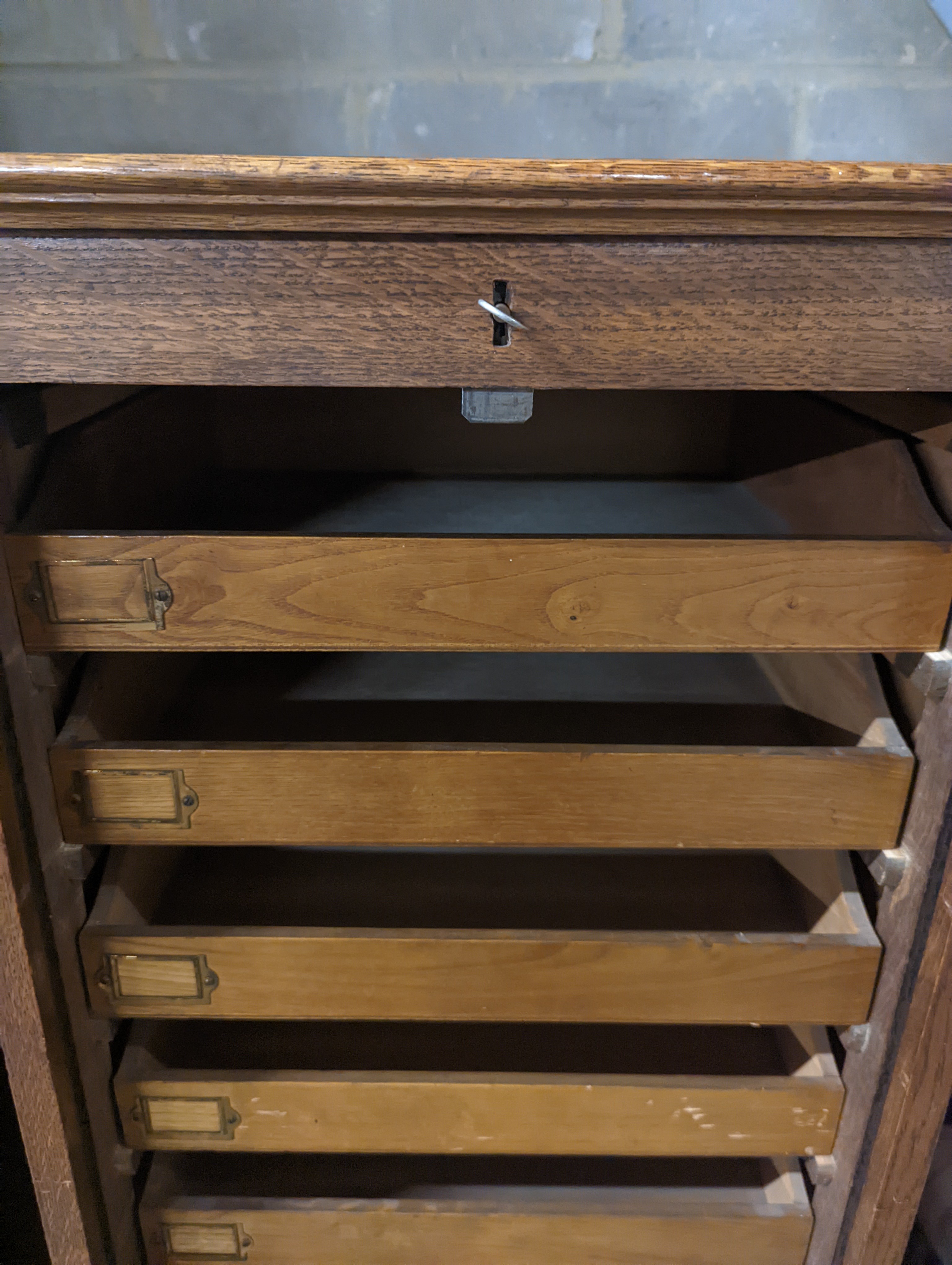 An early 20th century oak tambour filing cabinet, width 49cm, depth 40cm, height 125cm